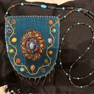 Gorgeous velour peacock green zip pouch crossbody.